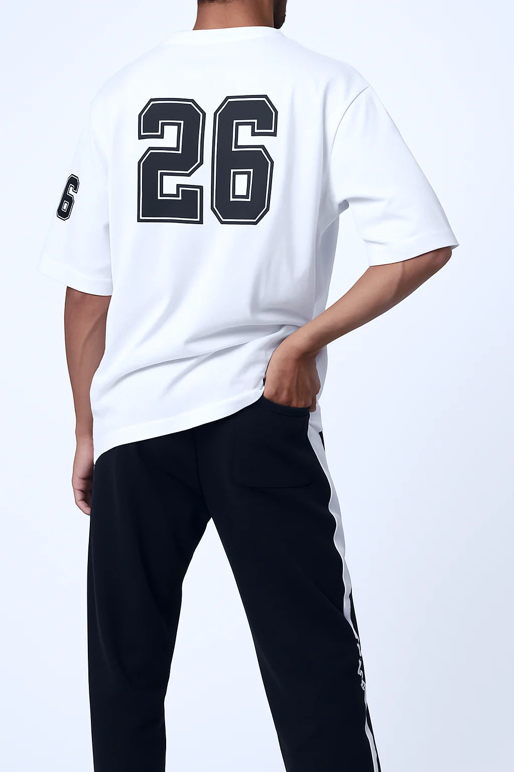 "Urban Street-Style Black Joggers with Bold Graphics"